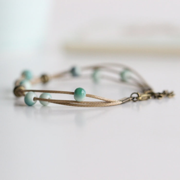 Turquoise Bead Hand-Woven Bracelet